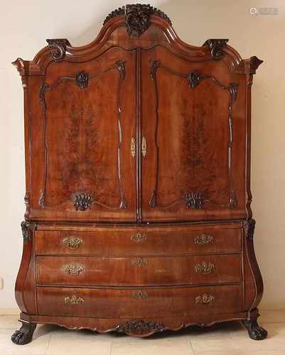 18th Century Dutch mahogany cabinet with convex beautiful carvings and claw feet. Minor damage.