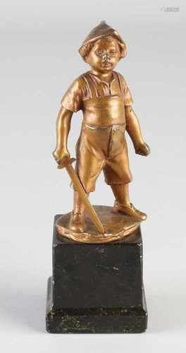 Signed antique bronze figure in black marble base. Boy with sword. Approximately 1910. By G. Jaeger.