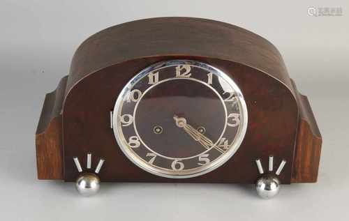 Carrot Walnut oak Art Deco table clock with chrome. Approximately 1935. Size: 22 x 38 x 14 cm. In