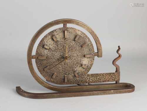 Hammered wrought iron Art Deco table clock with electric clockwork. Approximately 1940. Size: 22 x