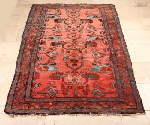 Old Persian rug. Floral, earthy + blue. Size: 190 x 130 cm. In fair / good condition.