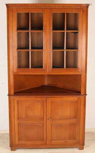 Oak Louis XVI-style corner cabinet with panels. Circa 1930 - 1940. Size: 186 x 100 x 55 cm. In