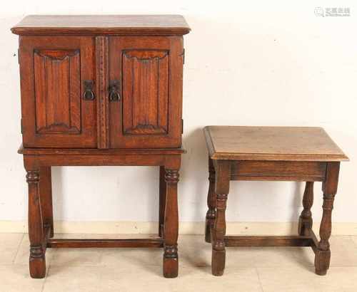 Two Neo Gothic oak furniture. Second half 19th century. One time table to write panels. One time