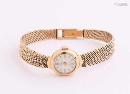 Yellow gold women's watch, 750/000, with yellow gold braided band. Round watch, ø 17mm, Exactus,