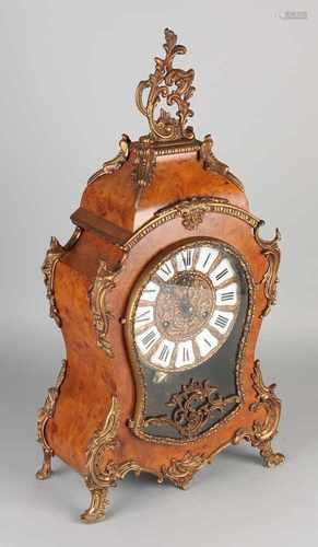 French-style table clock with walnut effect. Second half 20th century. Eight day-movement, half-hour