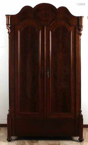 Biedermeier mahogany two-door cabinet with bowed head. Circa 1870. Cabinet has recently been