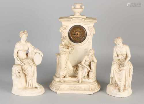 Bisquit porcelain antique clocks couple. Circa 1900. Greek representation. Minimal damage. Size: H