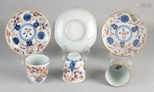 Three 18th century Chinese porcelain chocolate cups and saucers. One head chip, a single head hair