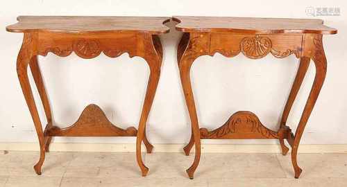 Two Oriental wood inserted wall console tables. 20th century. Size: 87 x 35 x 86 cm. In good