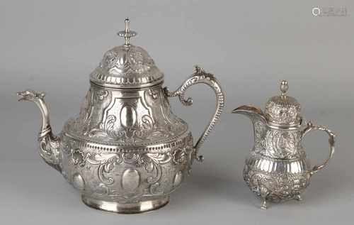 Silver bowl and creamer, 833/000, silver can round base decorated with cartouchen, shells and