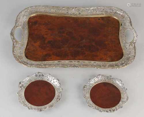 Tray and two saucers with silver 833/000. Rectangular tray with openwork silver border with