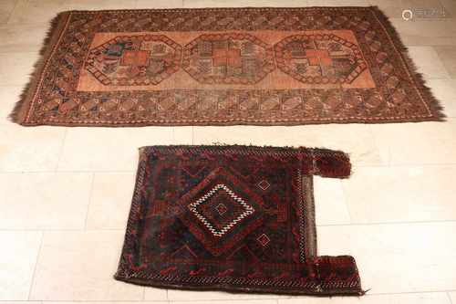 Two Persian rugs. One kameelzak. One kilim rug in sand colors. Size: 90 x 71 cm. / 200 x 103 cm.