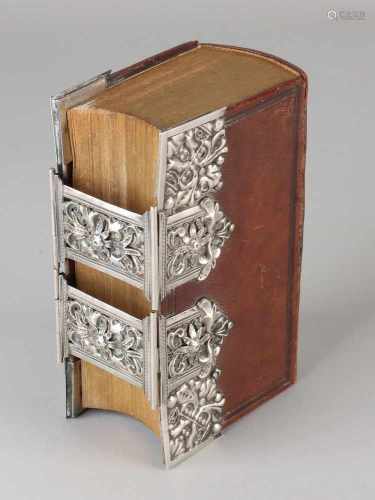 Bible with silverware. 833/000. Bible with brown leather cover decorated with 4 silver corner pieces