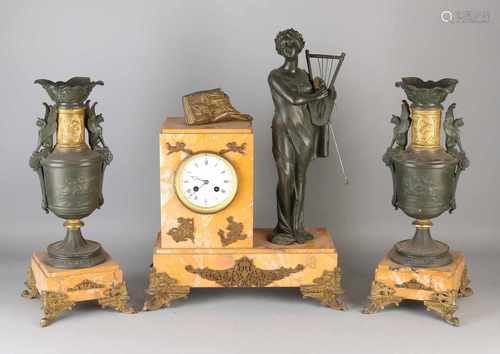 Three-piece heavy 19th century French clocks ocher couple. Circa 1870 Second Empire. With