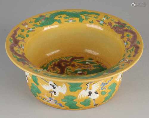 Large Chinese porcelain drakenkom with ocher glaze and Cheng Lung bottom mark. Dimensions: H 10 x