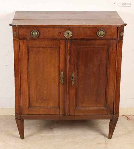 Antique Dutch oak Louis Seize penantkast with original ring fittings and drawers behind the doors.