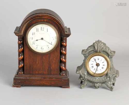 Two antique clocks. Comprising: Sink Alarm clock fog, circa 1900. French oak table clock,