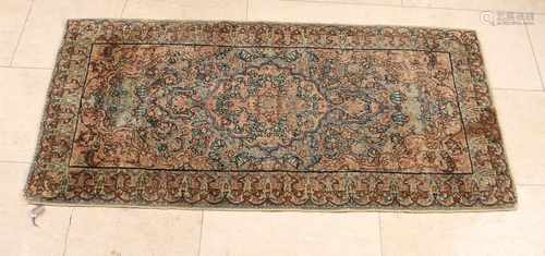 Fine knotted Persian rug silk. Multicolored. Size: 120 x 60 cm. In good condition.