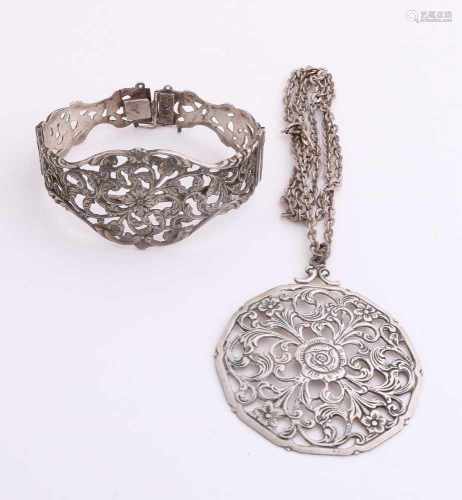 Silver pendant, bracelet, and 835/000, 800/000, long anchor collier, 60 cm., To which is a round
