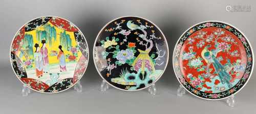 Three antique Japanese porcelain decorative dishes. Divers. Circa 1900. Size: Ø 30-31 cm. In good