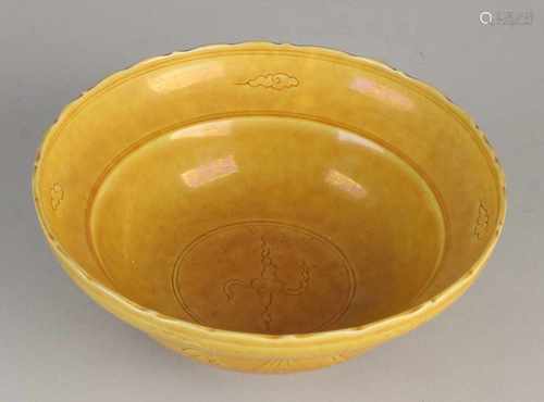 Chinese porcelain bowl glazed ocher crane / clouds decor + six digits bottom mark. With molded