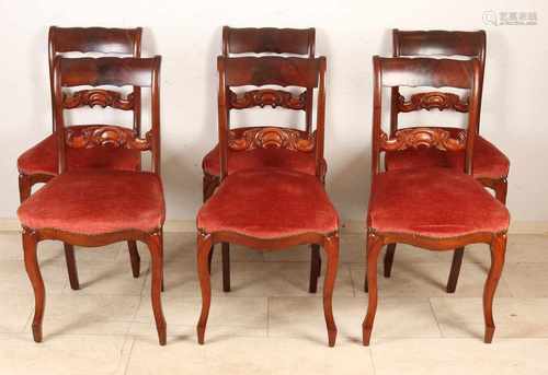 Six antique mahogany Biedermeier chairs with cassis-colored velor upholstery. Approximately 1860.