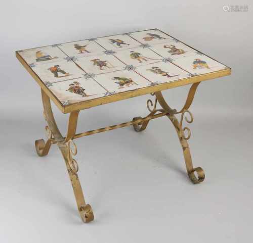 Wrought iron table with antique Makkum polychrome tiles. In 17th century style. Size: 40 x 60 cm. In