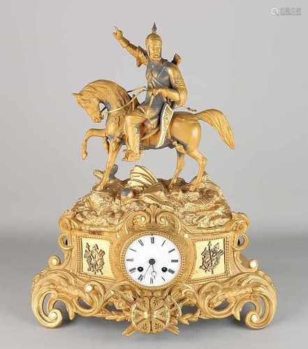 French Gilt bronze mantle clock with knights on horseback. Circa 1840. Eight day-movement, half-hour