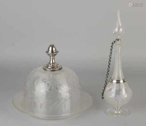 Cheese dome and decanter with silver 833/000. A crystal glass cheese dome wire with leaf