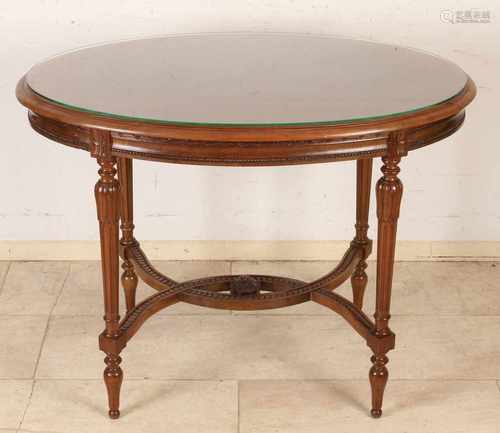 Walnut Louis XVI style oval table leg with cross-connection. Circa 1880. Dimensions: 73 x 98 x 63