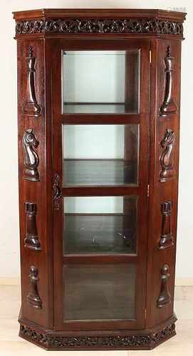 Octagonal two-door display case with teak faceted glass timber and sliced pieces. Second half 20th