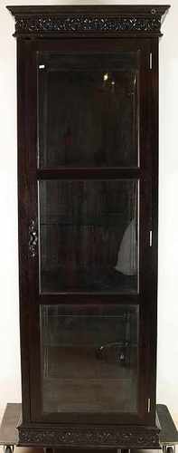 High one teak-door cabinet with shelves and faceted glass. Second half 20th century. Size: 224 x