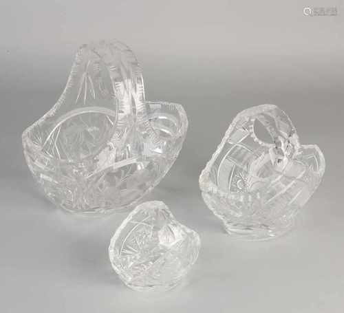 Three Bohemian crystal glasses baskets. Second half 20th century. Size: 10-20 cm. In good