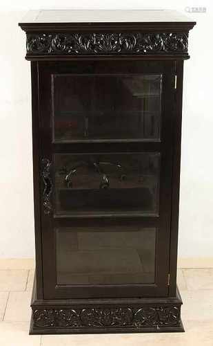 Dark stained wood inserted cabinet. One-door with shelves. 20th century. Size: 133 x 69 x 66 cm.