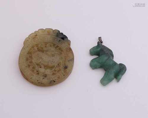 Two parts jade pendant in the shape of a horse, 34x24mm. and a round carved amulet with meander