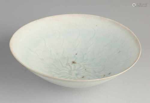 Large Chinese celadon porcelain dish in flower decor. Size: H 6.5 x 21.5 cm dia. In good condition.