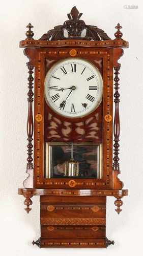 American antique wall clock with intarsia. Circa 1910. Size: 84 cm. In good condition.