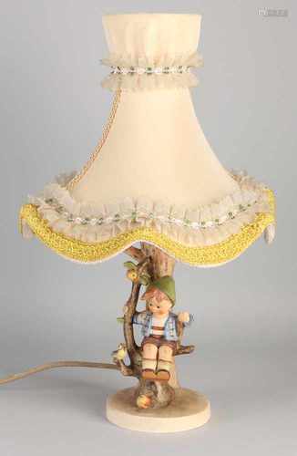 60-Year German Hummel table lamp. Boy in tree with bird. Minimum chip bottom, part of the tree