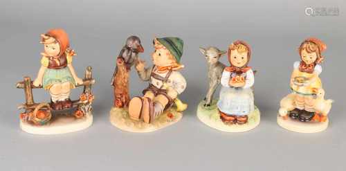 Four Hummel figures of Goebel. Comprising: Girl sitting on fence with flower basket, No. 112/1.. Boy