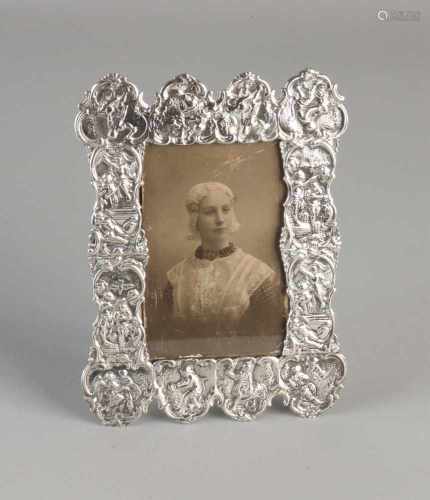 Silver photo frame, 833/000, rectangular model made out of antique bible locks with Figs. 14x11cm.