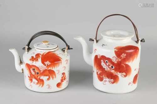 Two 19th century Chinese porcelain jars with red pull Foo dogs + text + one bottom mark. Chip spout.