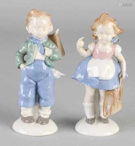 Two German porcelain figures. Gräfental marked with eagle and crown. Circa 1930. Boy and girl with