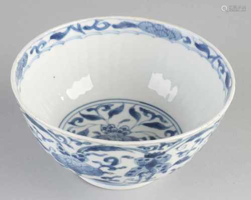 17th - 18th Century Chinese porcelain bowl with floral / butterfly decor. Bottom Brand. Hairline.