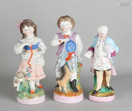 Three bisquit porcelain figures. One chip at foot. 20th century. Size: H 19-21 cm. In good