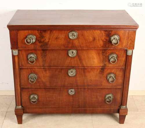 Gave Dutch mahogany four-drawer Louis Seize / Empire chest of drawers with original brass ferrule.