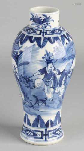 19th Century Chinese porcelain blue and white vase with figures in landscape decor. With four