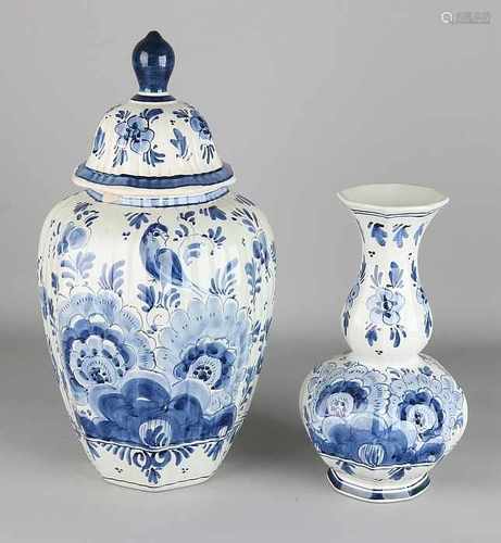 Twice antique Delft Fayence. Circa 1930. One time lump vase. One time octagonal vase, edge damage.