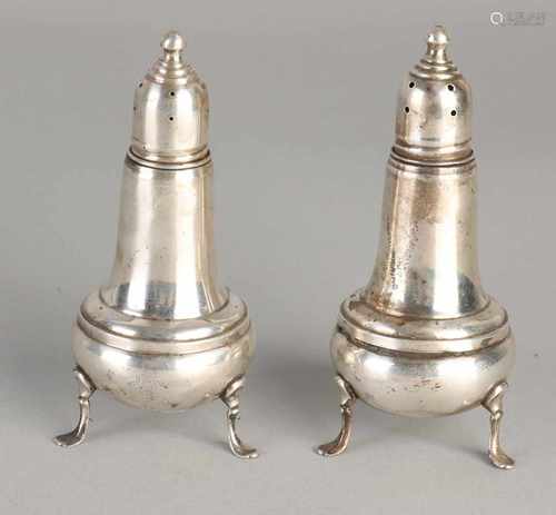 Two silver casters, 925/000, placed on three legs. ø6x12cm. What dented.