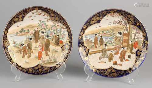 Two 19th century Japanese Satsuma porcelain plates with figures in garden decor. Bottom Brand. Size: