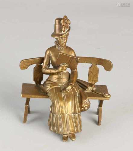 Antique bronze figure. Woman reading on bench. Circa 1915. Size: 12 x 11 x 7 cm. In good condition.